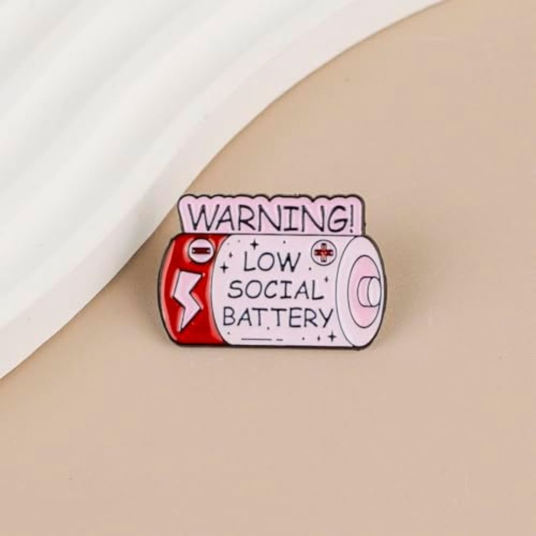 Low social battery enamel pin pink warning badge