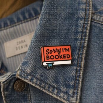 “Sorry I’m Booked” Enamel Lapel Pin | Witty Book Brooch for Bibliophiles & Readers