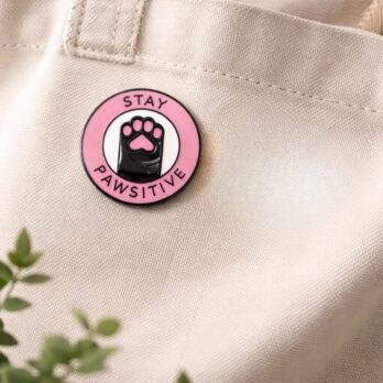 “Stay Pawsitive” Cat Paw Enamel Lapel Pin | Cute Pink Circular Brooch for Pet Lovers