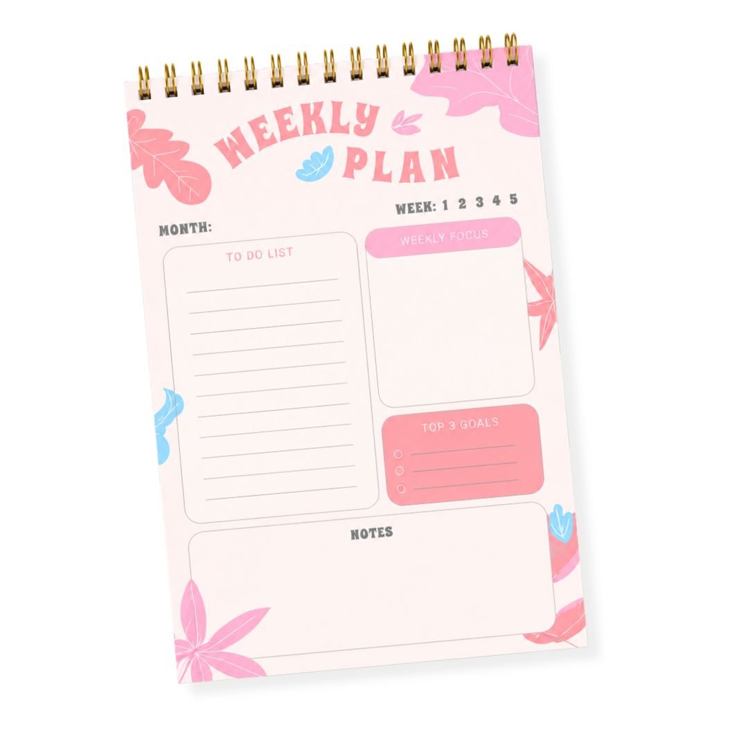 Weekly planner notepad pink botanical spiral bound full layout product shot white background