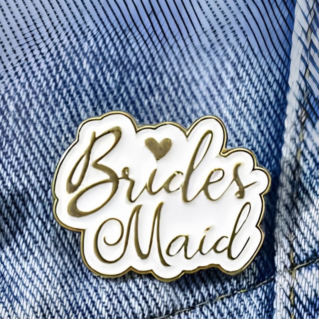 Bridesmaid enamel pin with gold script and heart accent cute bridal lapel pin on denim jacket