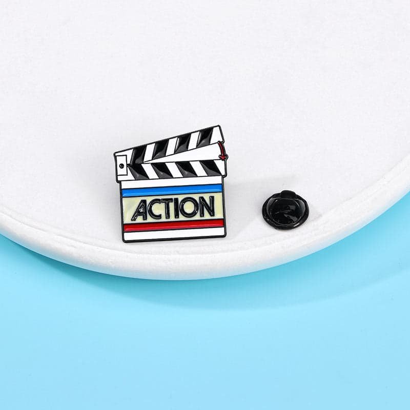 action clap enamel pin badge