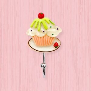 Lime green drizzle cupcake wall hook decorative cute home accessory with cherry and strawberry on pink wall