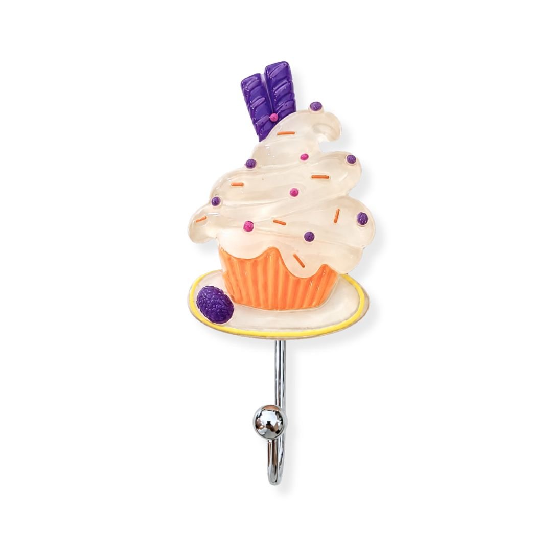 vanilla blueberry cupcake wall hook on pink textured background showing full design with purple wafer sprinkles and chrome hook