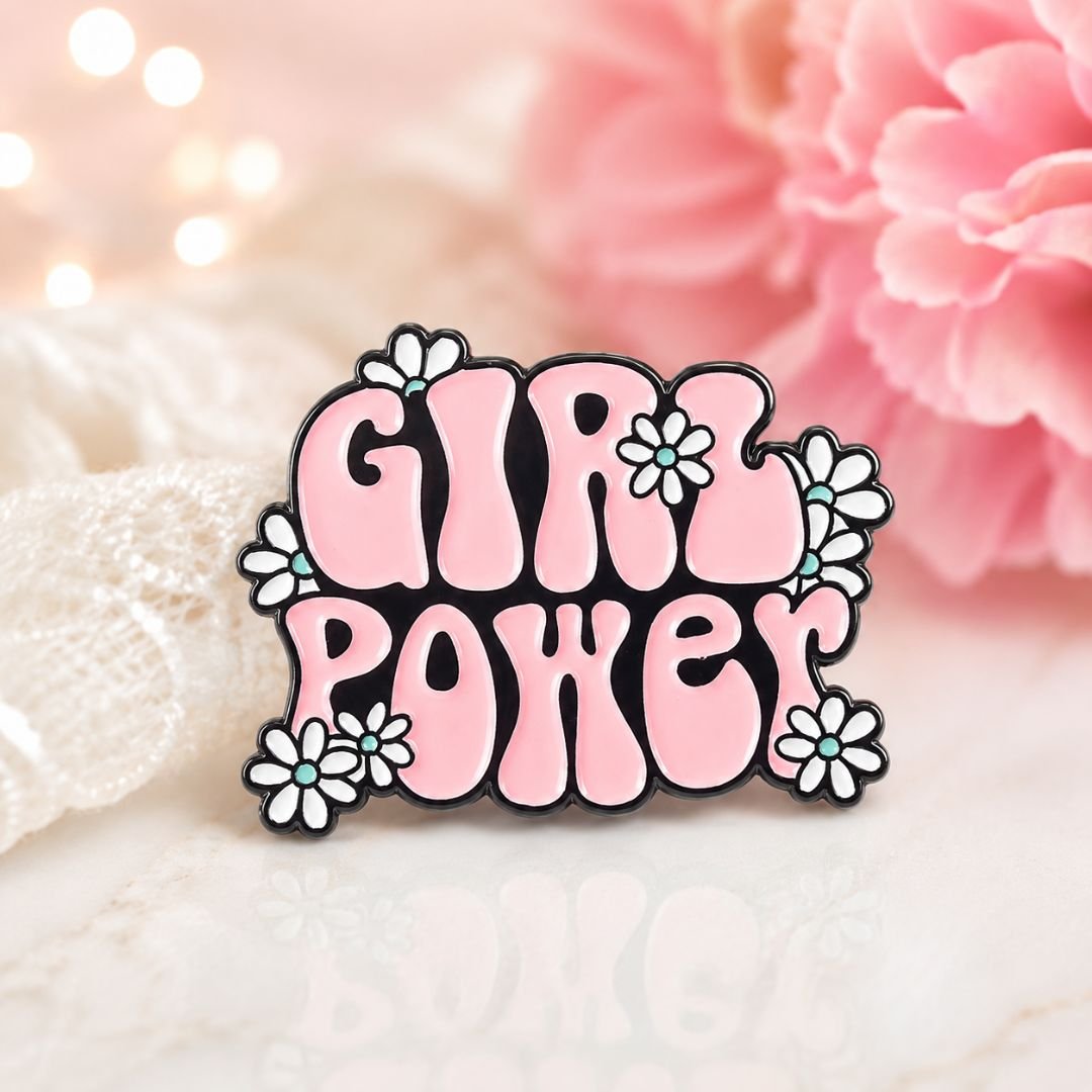 Girl power floral enamel pin pink bubbly typography white daisy flowers black background feminist lapel pin lifestyle